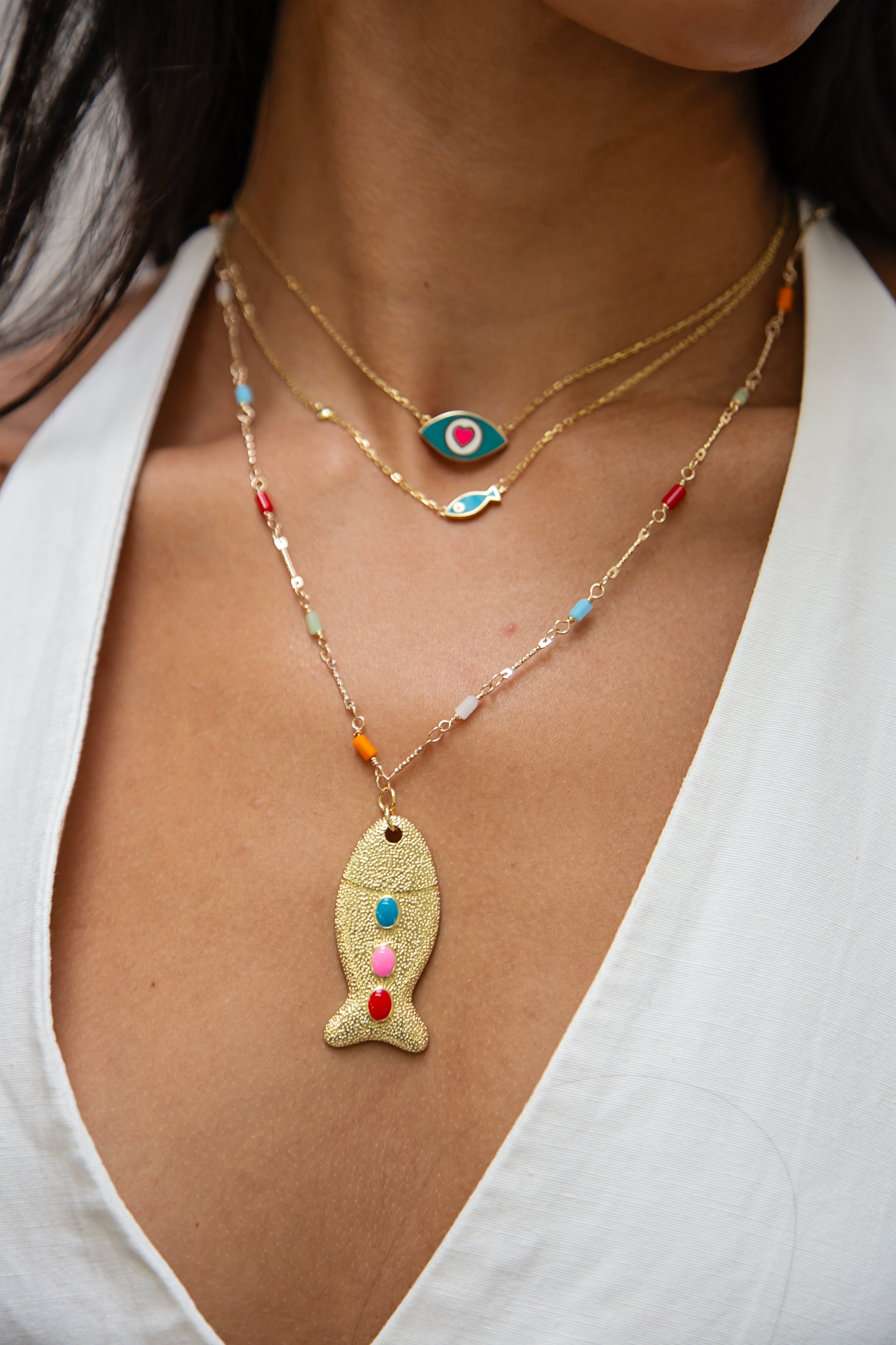 Fish and Eye Necklaces